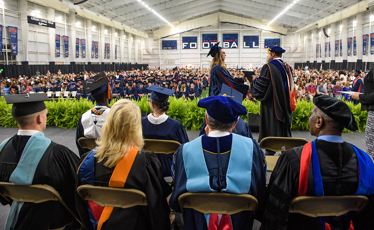 General Studies faculty and staff overlook the commencement ceremony. 